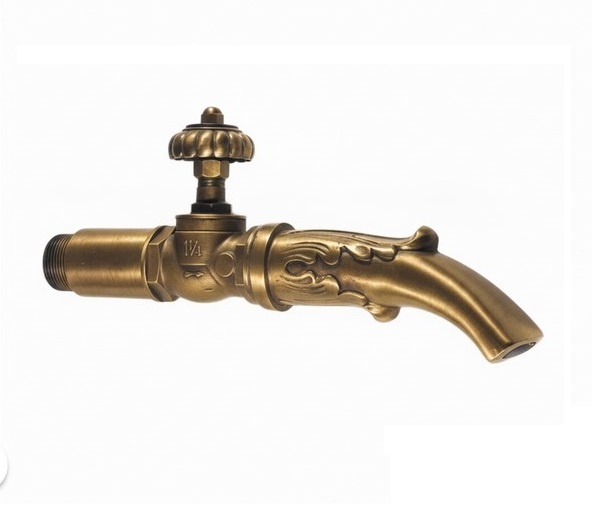 Large tap with decorative handle and spout in brass