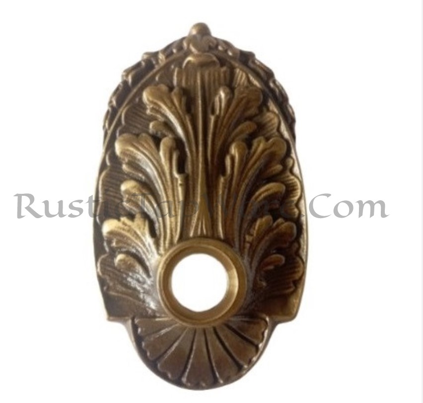 Artistic, floral ornated escutcheon in brass and oil rubbed bronze finish