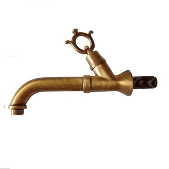 Vintage styled faucet with inclined handle in polished bronze finish