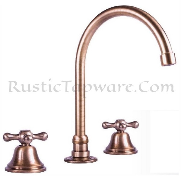 Deck mounted three hole basin water mixer tap in antique style with wooden or classic handles