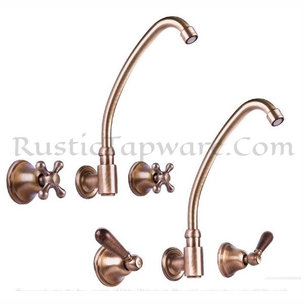 Wall mounted three-hole sink mixer with wooden handles in antique style and bronze finish